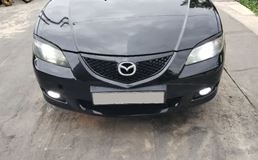 Реснички на фары для Mazda 3 седан 2003-