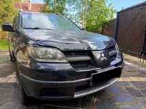 Реснички на фары MITSUBISHI OUTLANDER 2003-2006