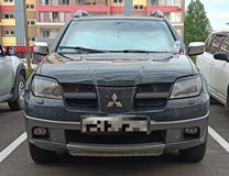 Реснички на фары MITSUBISHI OUTLANDER 2003-2006