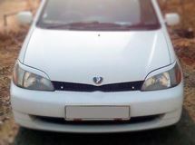 Реснички на фары для Toyota Platz SCP11 1999-2002 (дорестайлинг)