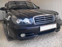 Накладки на передние фары (реснички) Hyundai Sonata 2001-2012