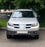 Реснички на фары MITSUBISHI OUTLANDER 2003-2006