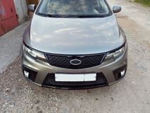 Накладки на передние фары (реснички) Kia Cerato 2008-2013