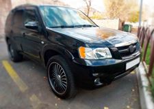 Реснички на фары для Mazda Tribute 2000-2006 (EP)