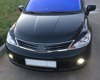 Накладки на передние фары (реснички) для Nissan Tiida (хэтчбек) 2008-2014