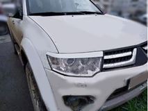 Реснички на фары Mitsubishi Pajero Sport 2008-2017